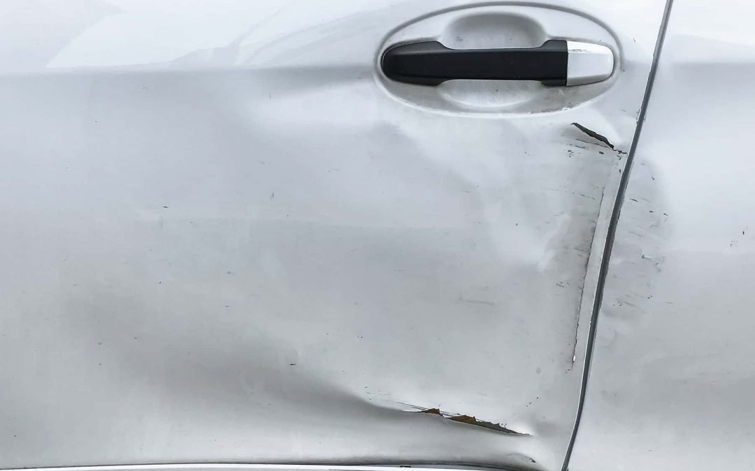 How to Fix a Dent in Car Door Without Paint: Easy DIY Steps